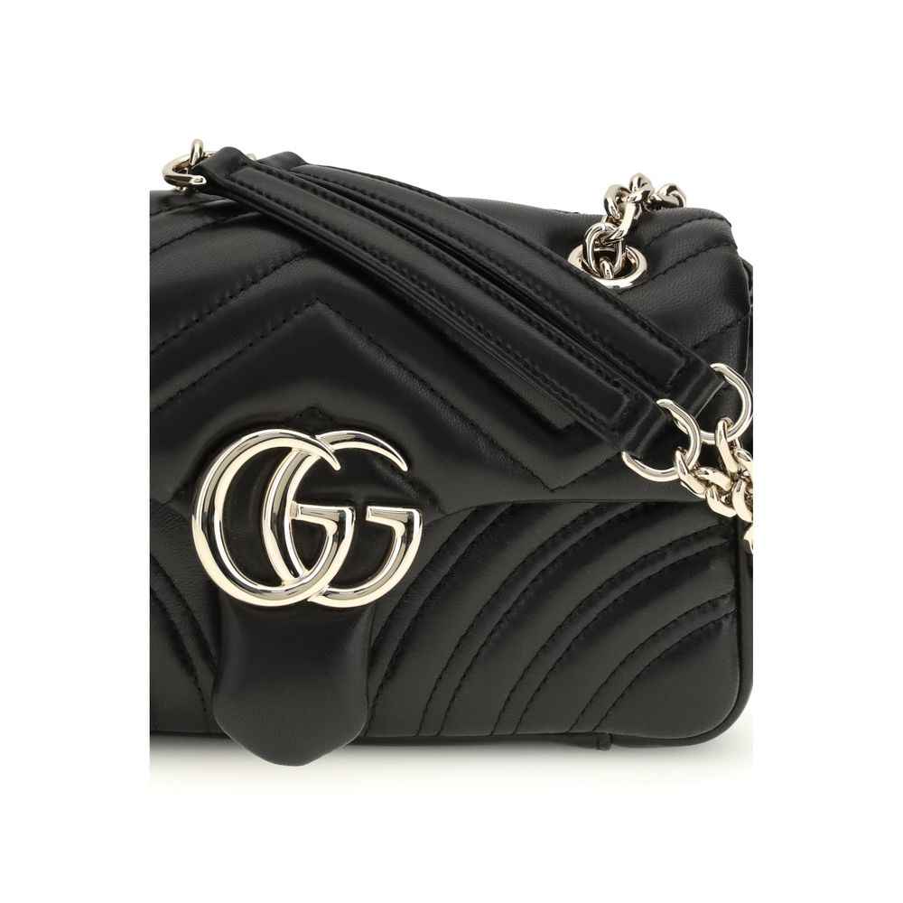Gucci GG Marmont small shoulder bag, black quilted calf leather, gold-tone hardware, logo detail