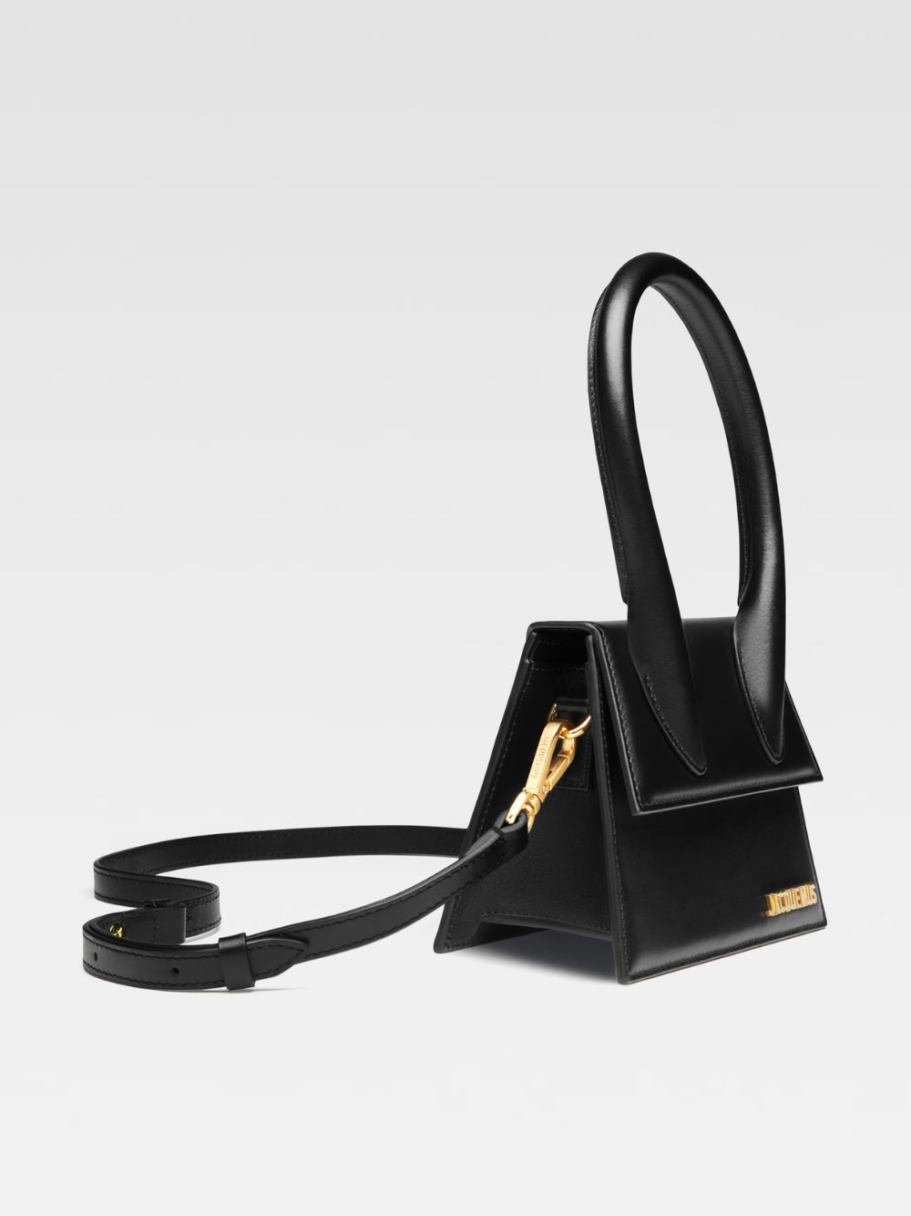 Jacquemus Le Chiquito Moyen black leather shoulder bag with gold hardware, side view