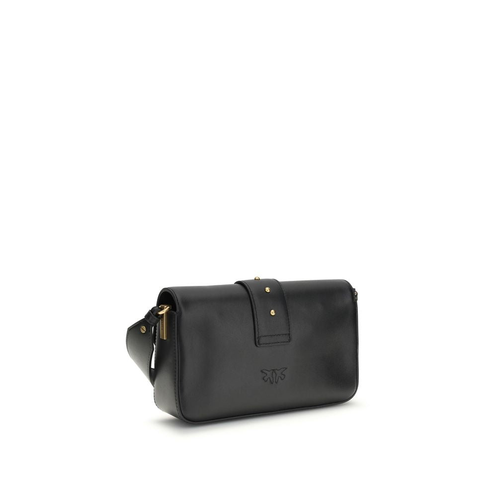 PINKO Mini Love black leather shoulder bag, gold hardware, three-quarter view.