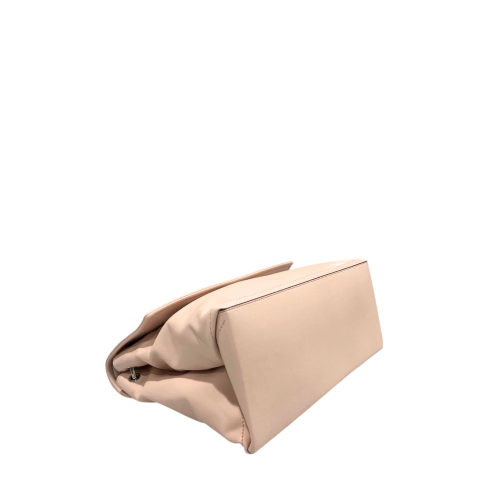 Twinset pink PU handbag with folded top, side view.