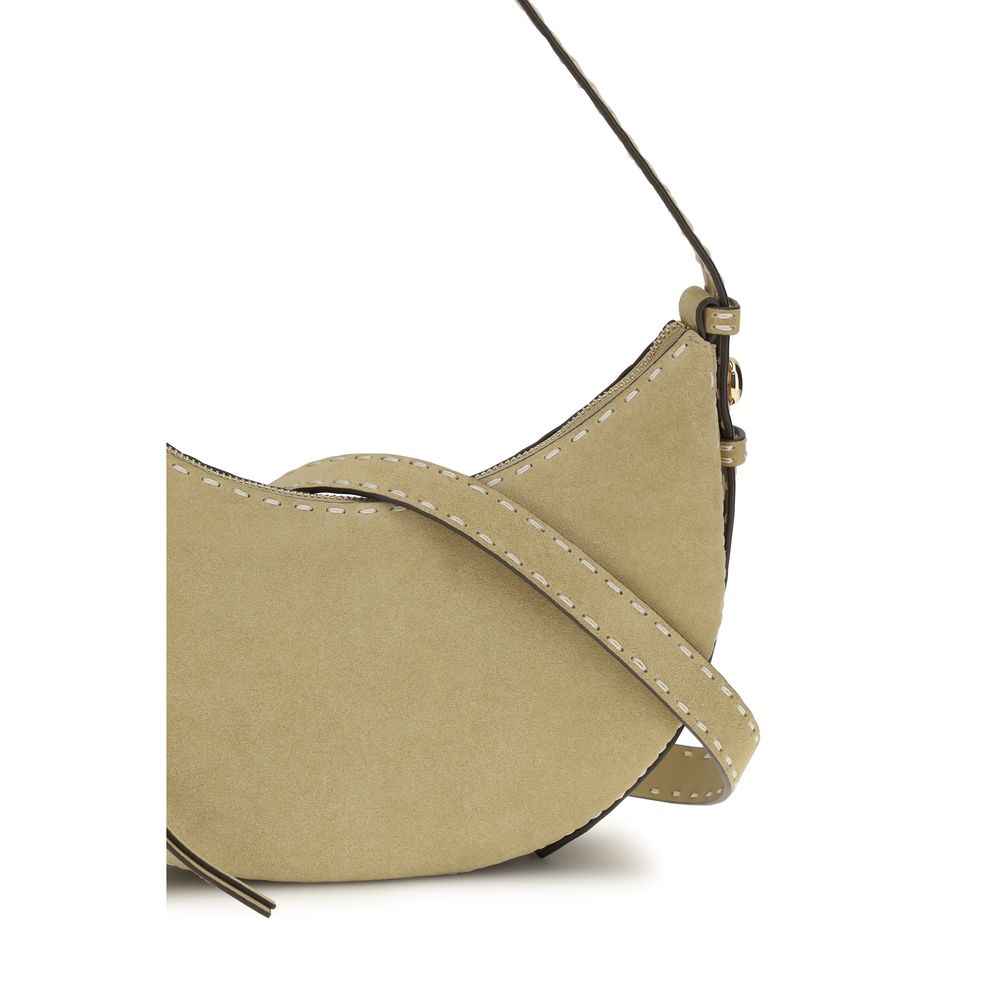 Tory Burch beige suede half-moon shoulder bag, side view