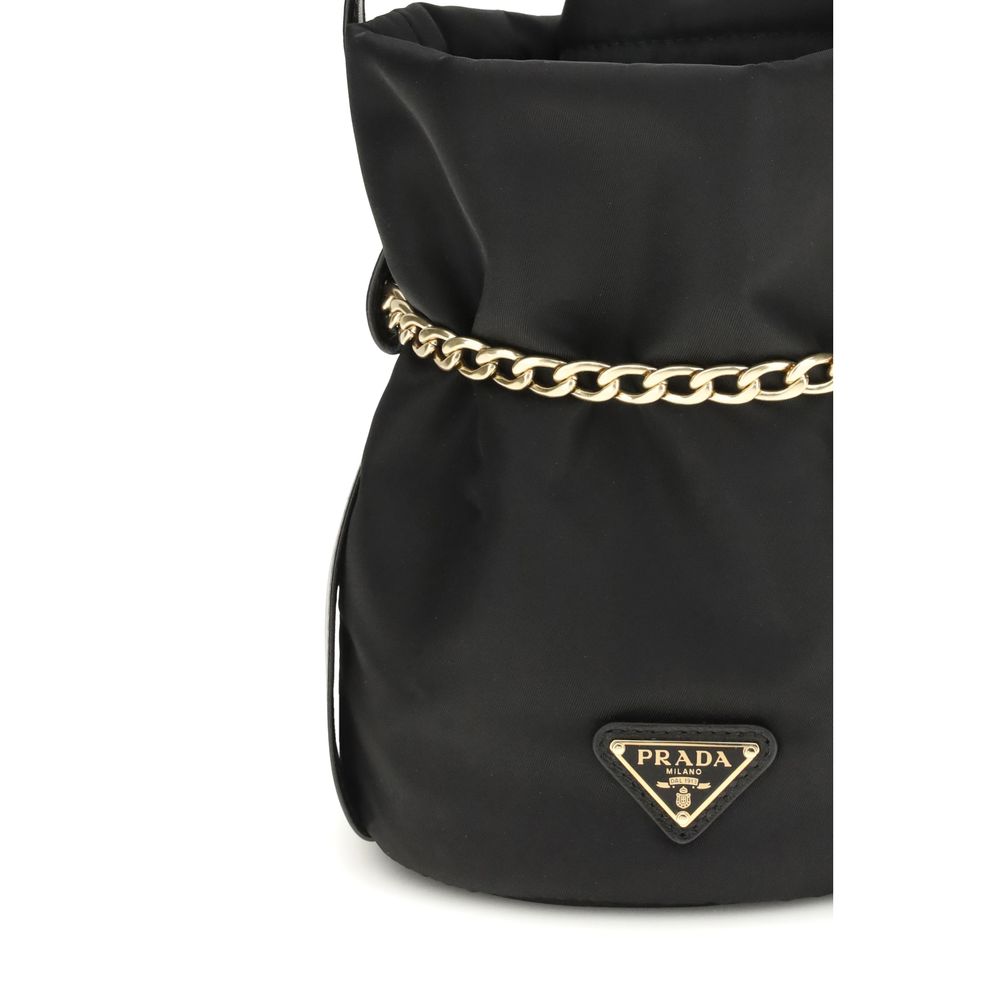 Prada Petit Sac Noir mini bag, black fabric, gold chain, front logo detail.