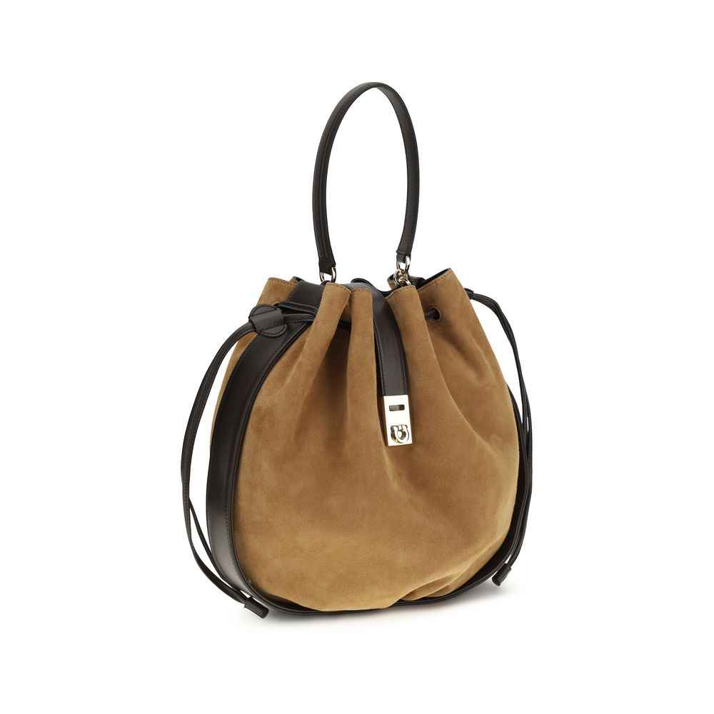 Ferragamo Hug Buckle Bucket Bag in brown suede with black leather trim, front view