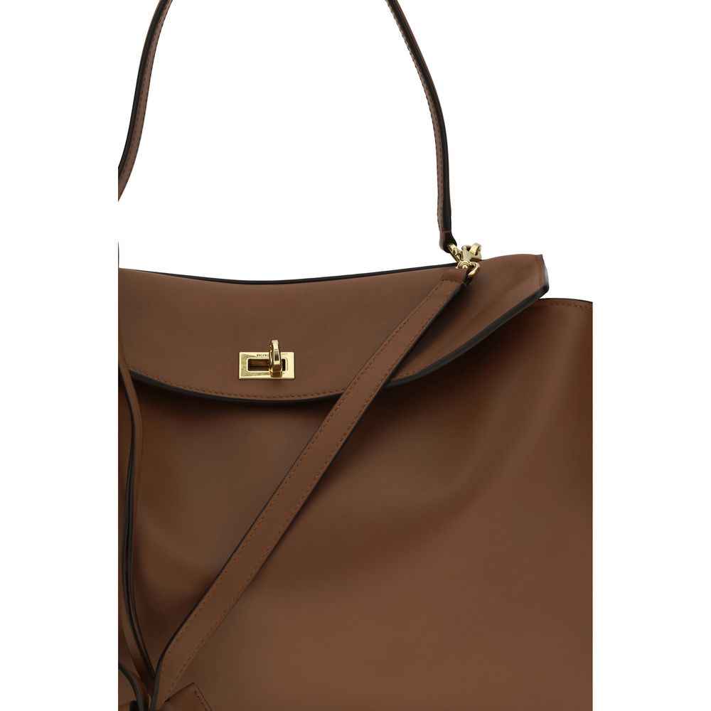 Balenciaga Bos Taurus shoulder bag in brown calf leather, front view.