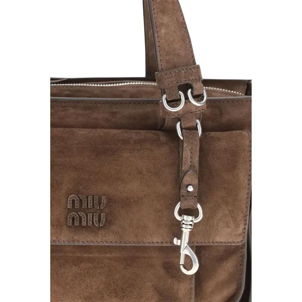 Miu Miu Bos Taurus brown suede shoulder bag logo detail.