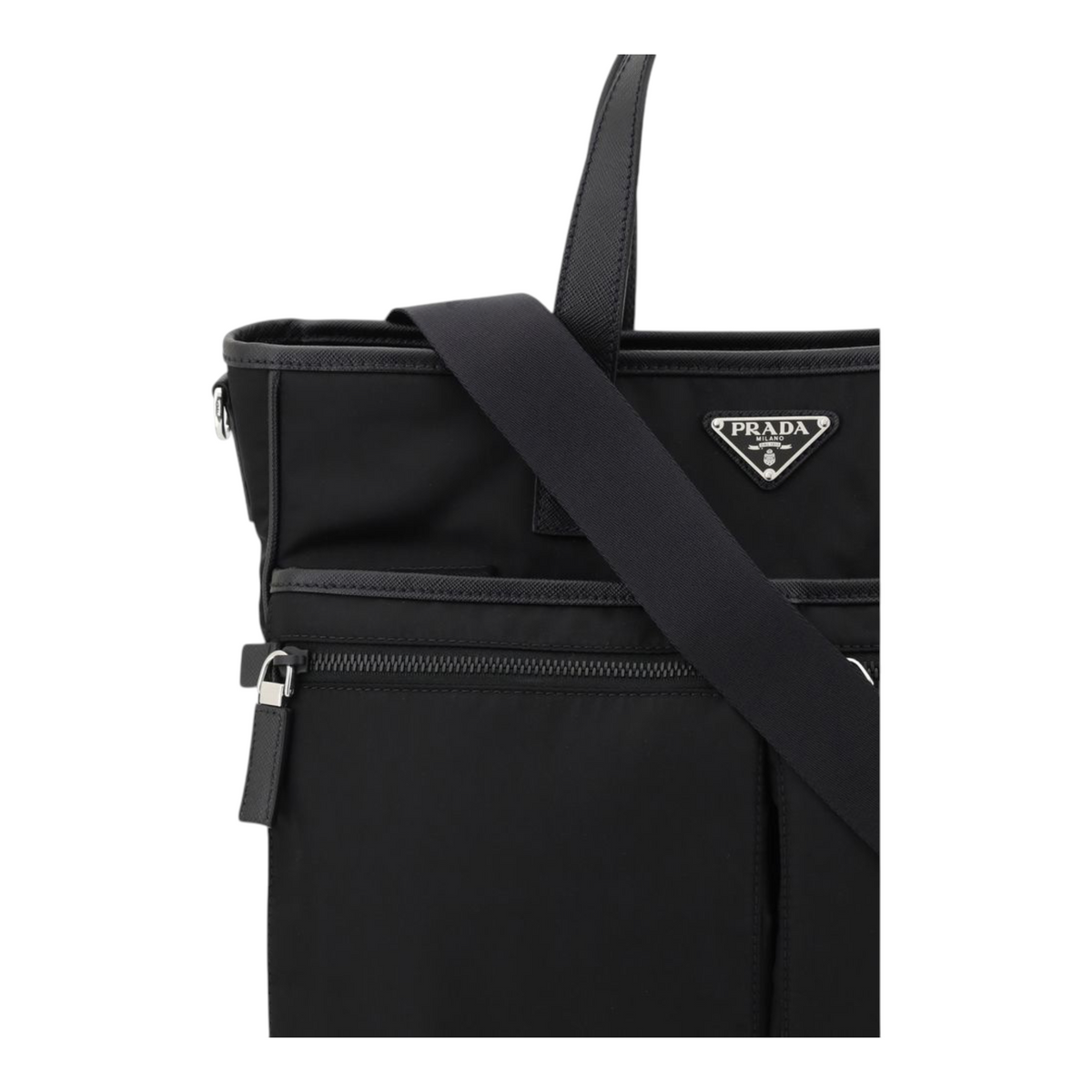 Bolso tote XT & Co Prada en Re-Nylon negro con logo triangular, asas de piel y correa ajustable al hombro.
