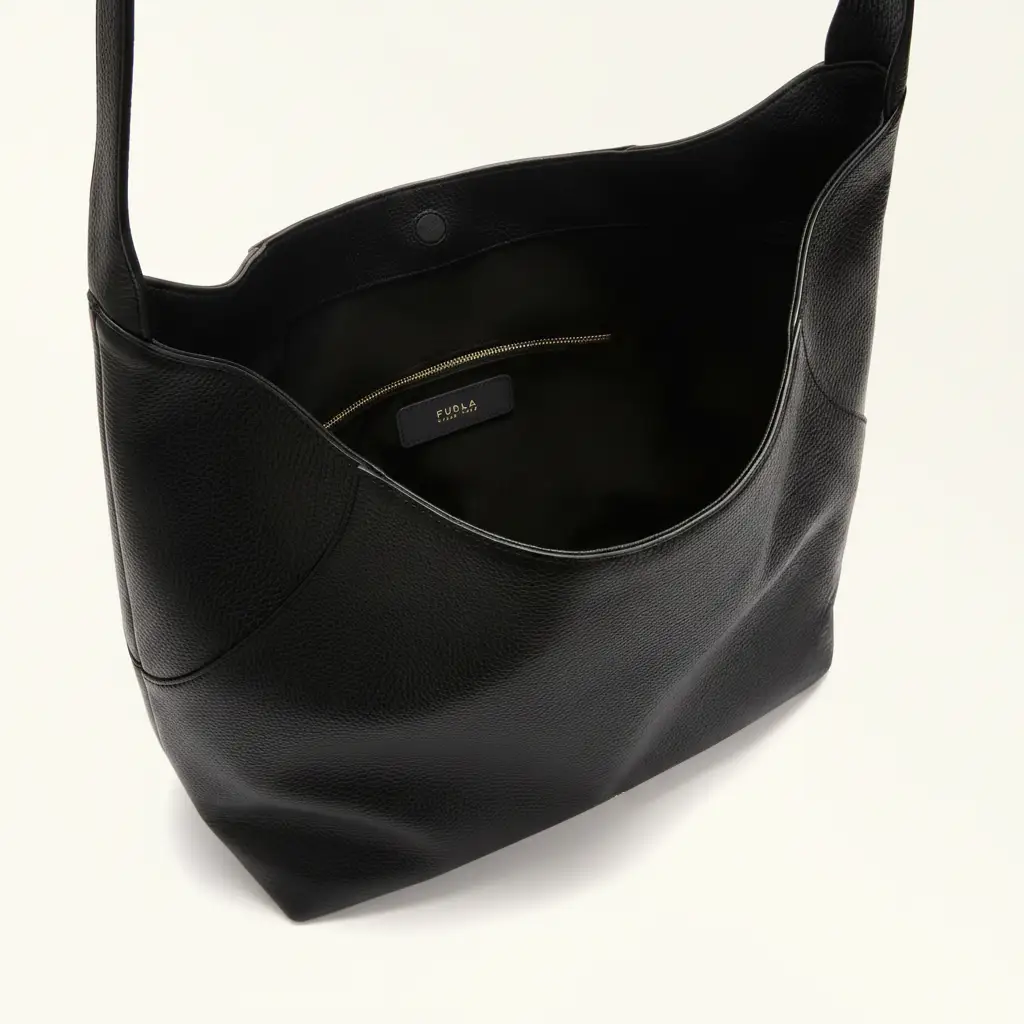 Furla Lara shoulder bag, black pebbled leather, zip pocket visible interior view