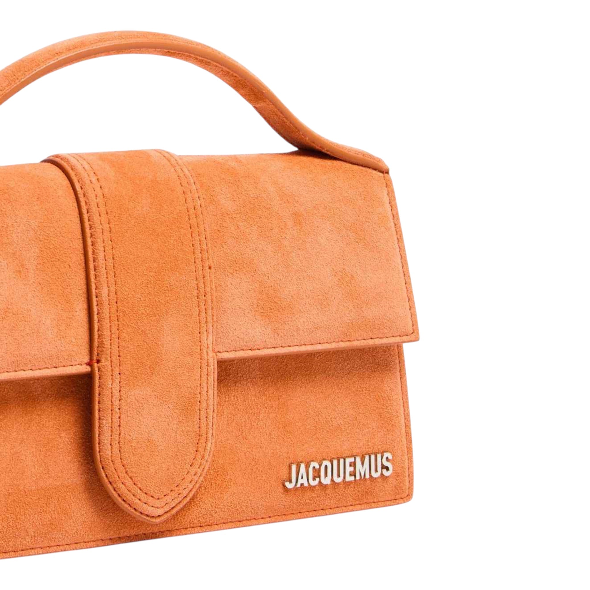 Bolso de mano Jacquemus Le Grand Bambino en piel color terracota con logo dorado, disponible en XT & Co