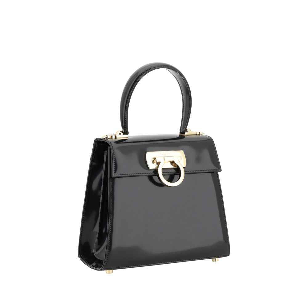 Ferragamo Iconic top-handle bag, black patent calf leather, gold hardware, front view