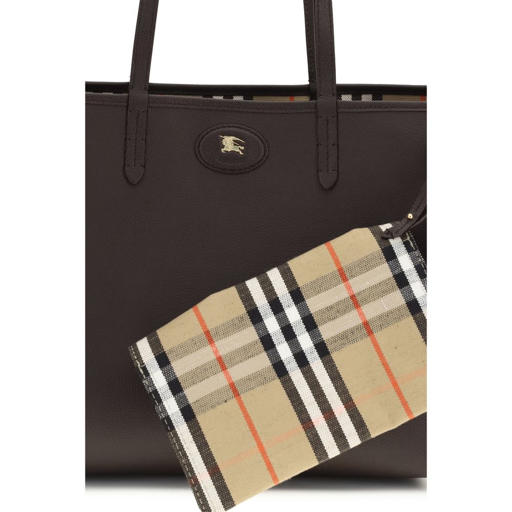 Burberry Bloomsbury Medium Reversible Tote Bag, brown pebbled leather with beige Burberry check accent, front view.