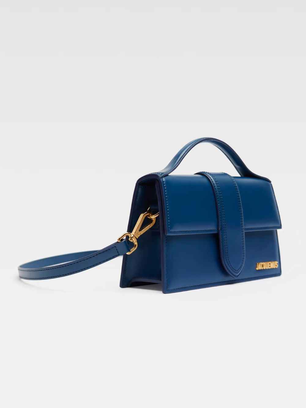 Jacquemus Le Grand Bambino dark navy leather crossbody bag with gold logo, front view