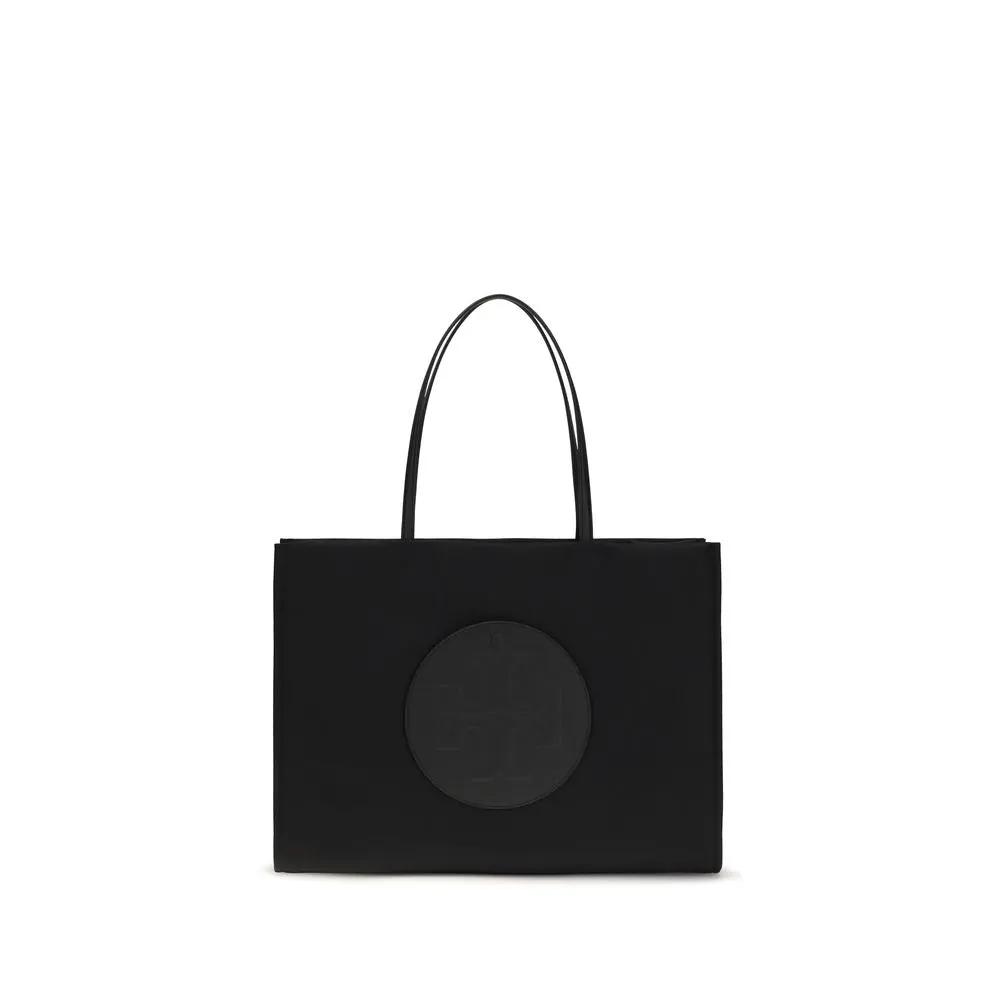 Tory Burch black nylon tote bag with circular logo patch, top handles front view