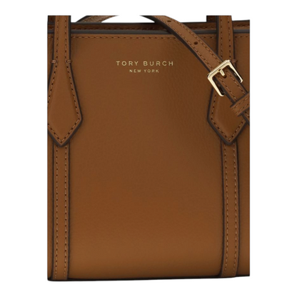 Bolso tote mini Perry de Tory Burch en piel de becerro marrón con detalles de XT & Co y correa ajustable.