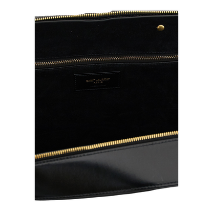 Interior del bolso XT & Co Sac De Jour de Saint Laurent en piel negra con cremallera dorada y logo grabado