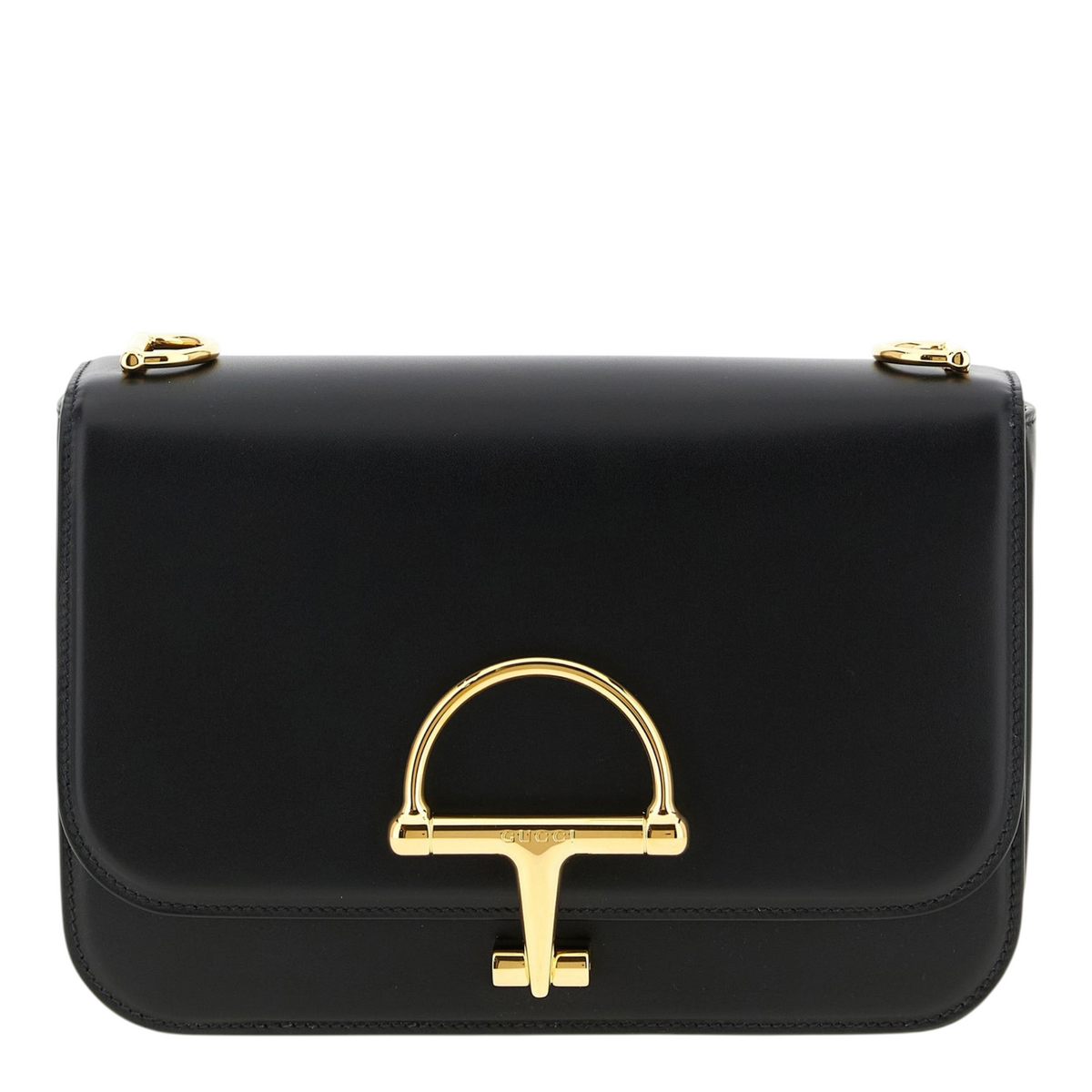 Bolso crossbody Siena de XT & Co en piel de becerro negra con detalle de medio horsebit metálico dorado en la solapa