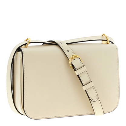 Bolso bandolera Siena de XT & Co en piel de becerro blanca con detalle de medio horsebit metálico y correa ajustable