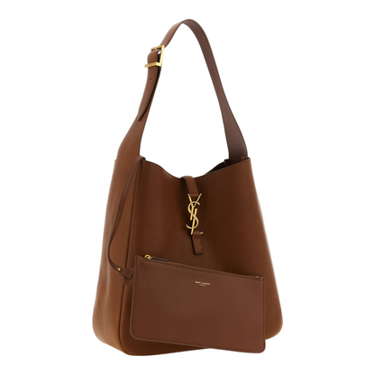 Bolso de hombro XT & Co Le 5 à 7 grande en piel de becerro marrón con cierre Cassandre y neceser extraíble.