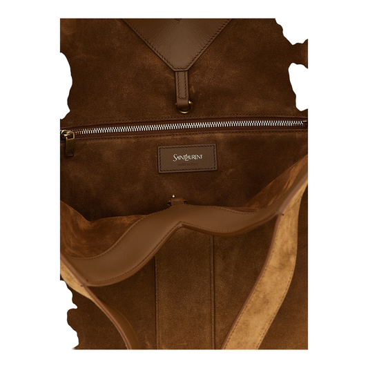 Interior del bolso tote Saint Laurent de ante marrón de XT & Co con bolsillo con cremallera y etiqueta de la marca