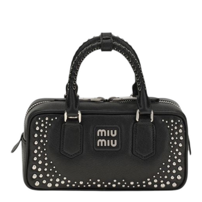 A black Miu Miu studded handbag with braided top handles and a silver-tone logo plaque, photographed on a clean white background.