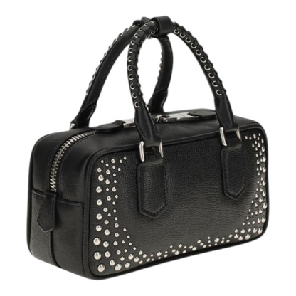 Bolso Arcadie de XT & Co en piel negra con tachuelas plateadas, asas superiores y cierre de cremallera.