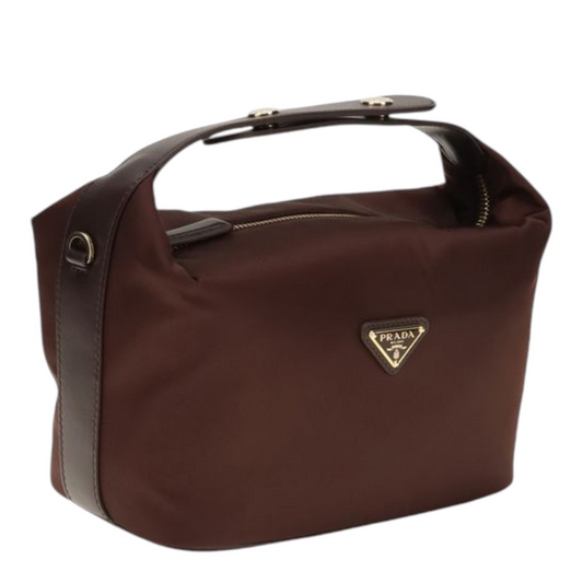 Bolso mini Chérie de XT & Co en Re-Nylon color burdeos con detalles de cuero y logo triangular esmaltado