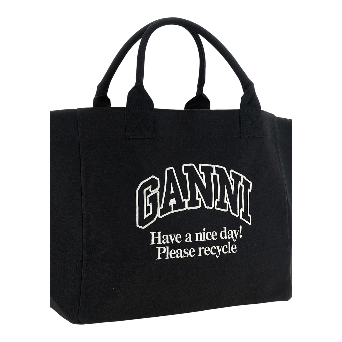Bolso shopper XXL XT & Co de lona de algodón reciclado negro con logo Ganni blanco y mensaje de reciclaje
