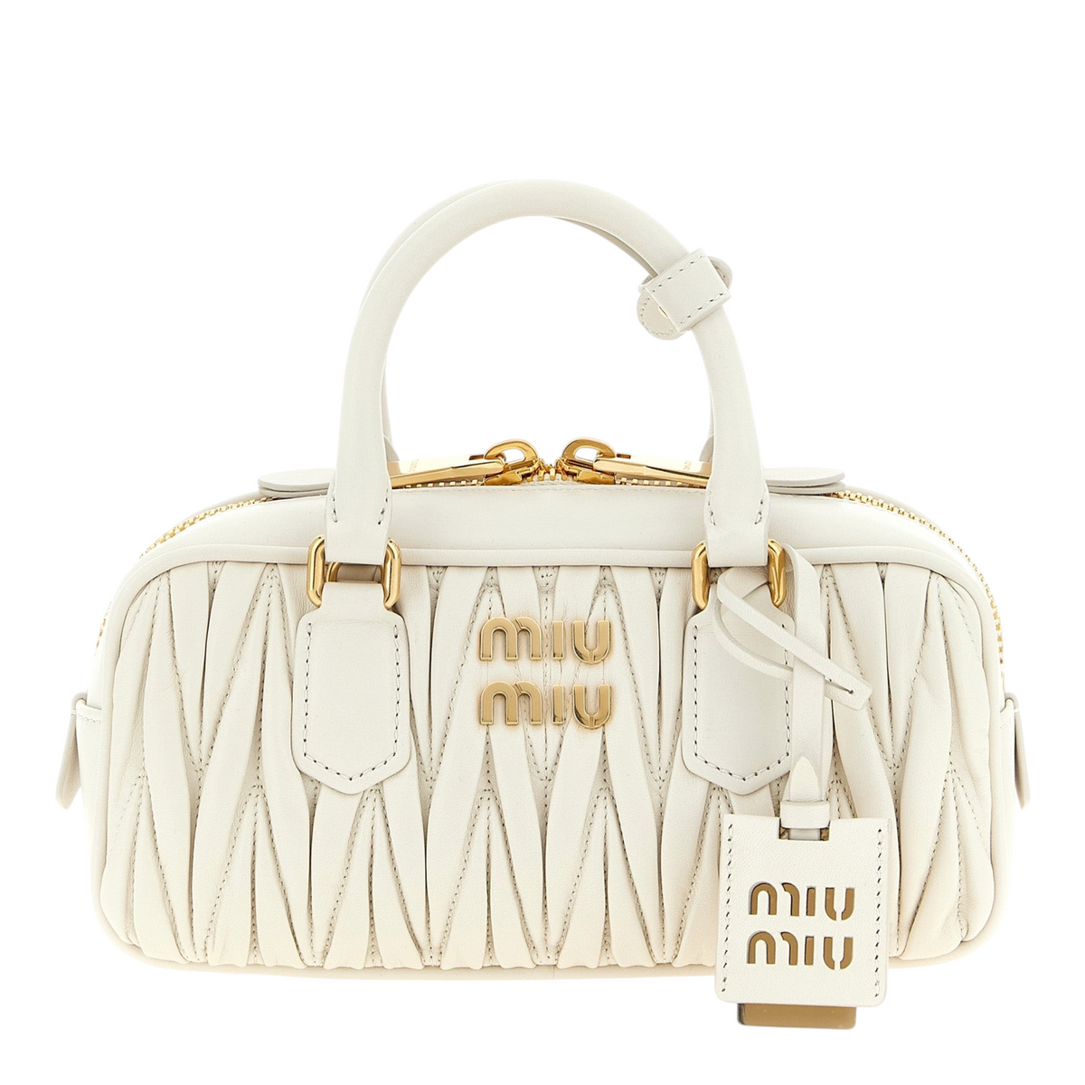 Bolso XT & Co Arcadie de piel nappa blanca matelassé con logo metálico frontal, asas tubulares y espejo extraíble.
