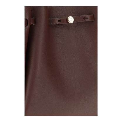 Bolso tote Romy de XT & Co en piel granulada color burdeos con detalle de cinturón fino y cierre metálico dorado