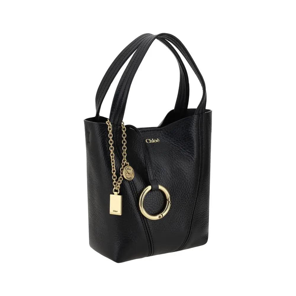 Chloé Spin-Shoulder Bag, black pebbled leather shoulder bag with gold hardware, front view.