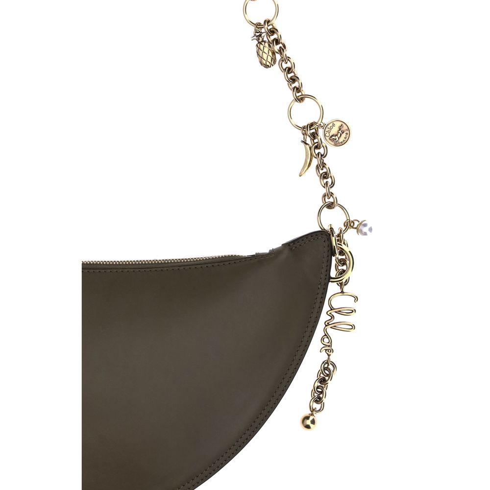 Chloé Icons charcoal leather shoulder bag, crescent-shaped silhouette, side view