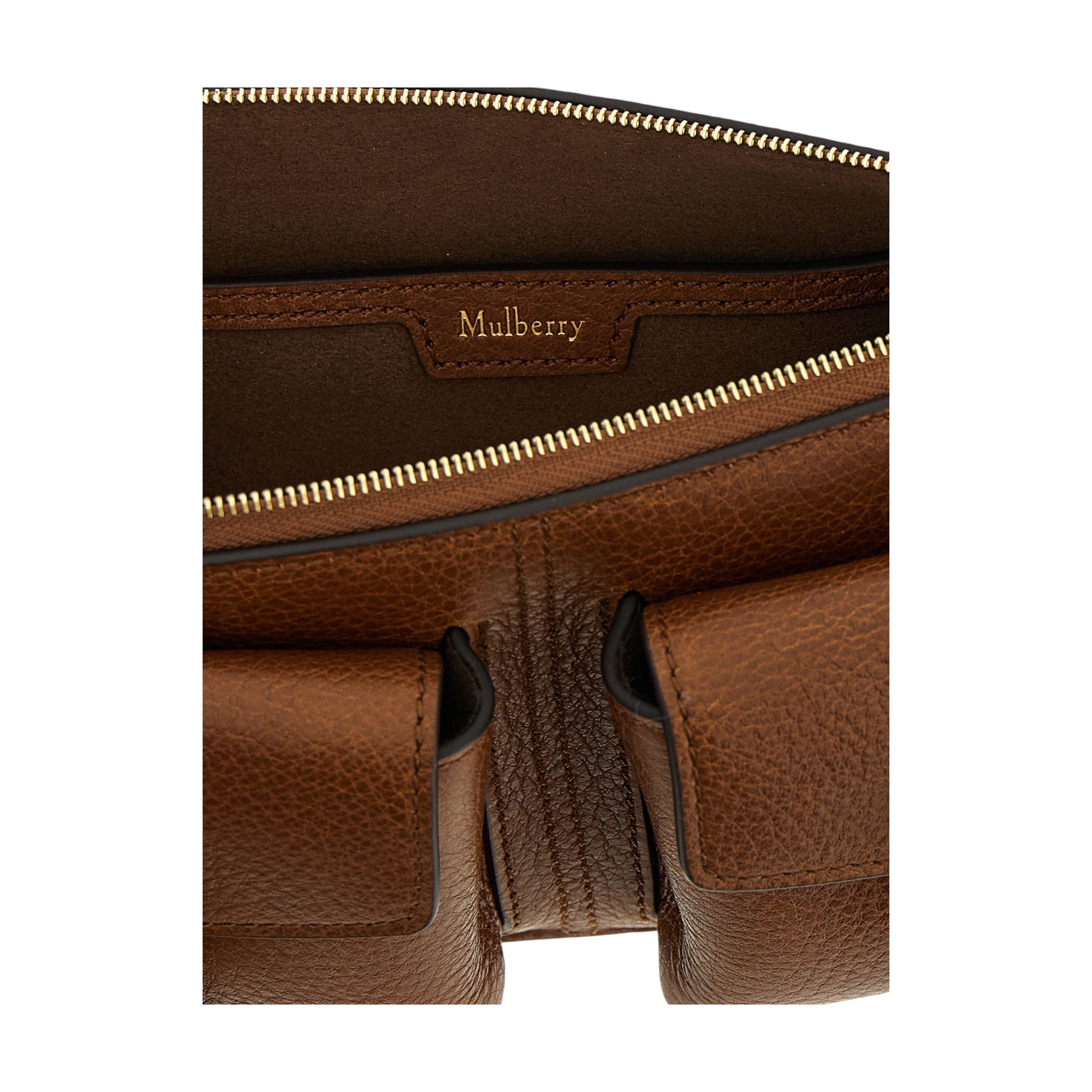 Detalle interior y bolsillos frontales de piel de becerro granulada marrón del bolso Mulberry Roxanne de XT & Co
